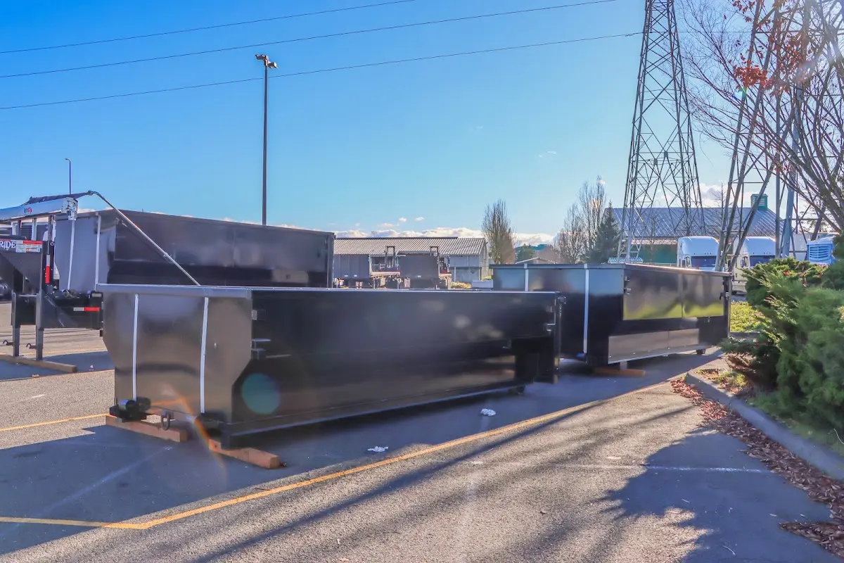 Roll-off dumpster ready for waste disposal at job site for 6 Yard Dumpster Rental in Applewood